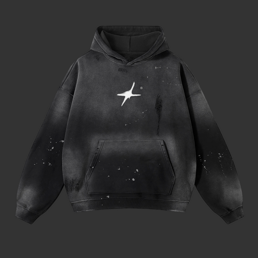 Black hoodie with a white star design on a white background