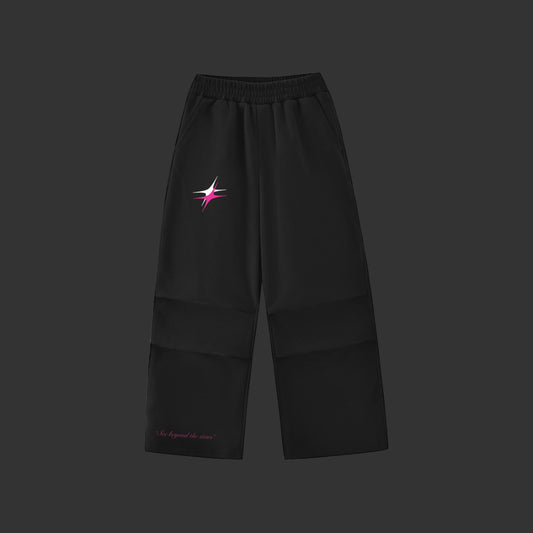 Black pants with a pink and white star design on a white background